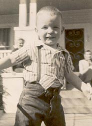 Mac as an outgoing toddler, playing on Ann St.