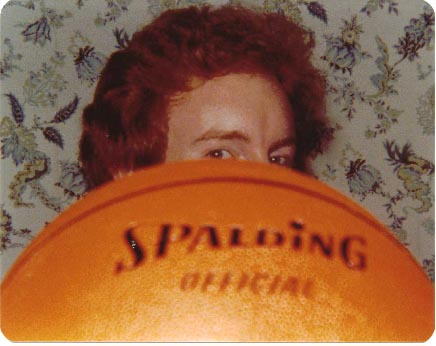 Mac using basketball to determine if his hair color was coming back.