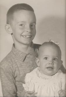 Mac, with his pride and joy, sister Betsy. She brightened his smile.